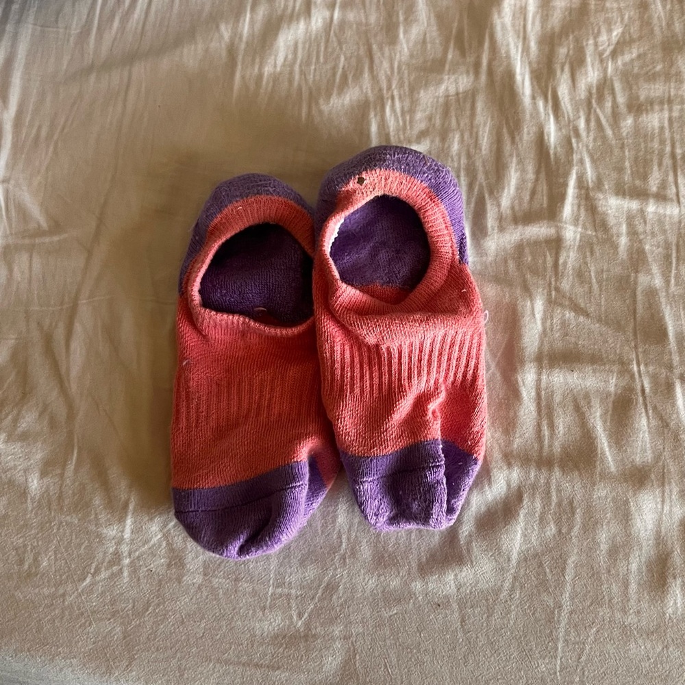 Women’s bright pink colorful no show socks worn 3x